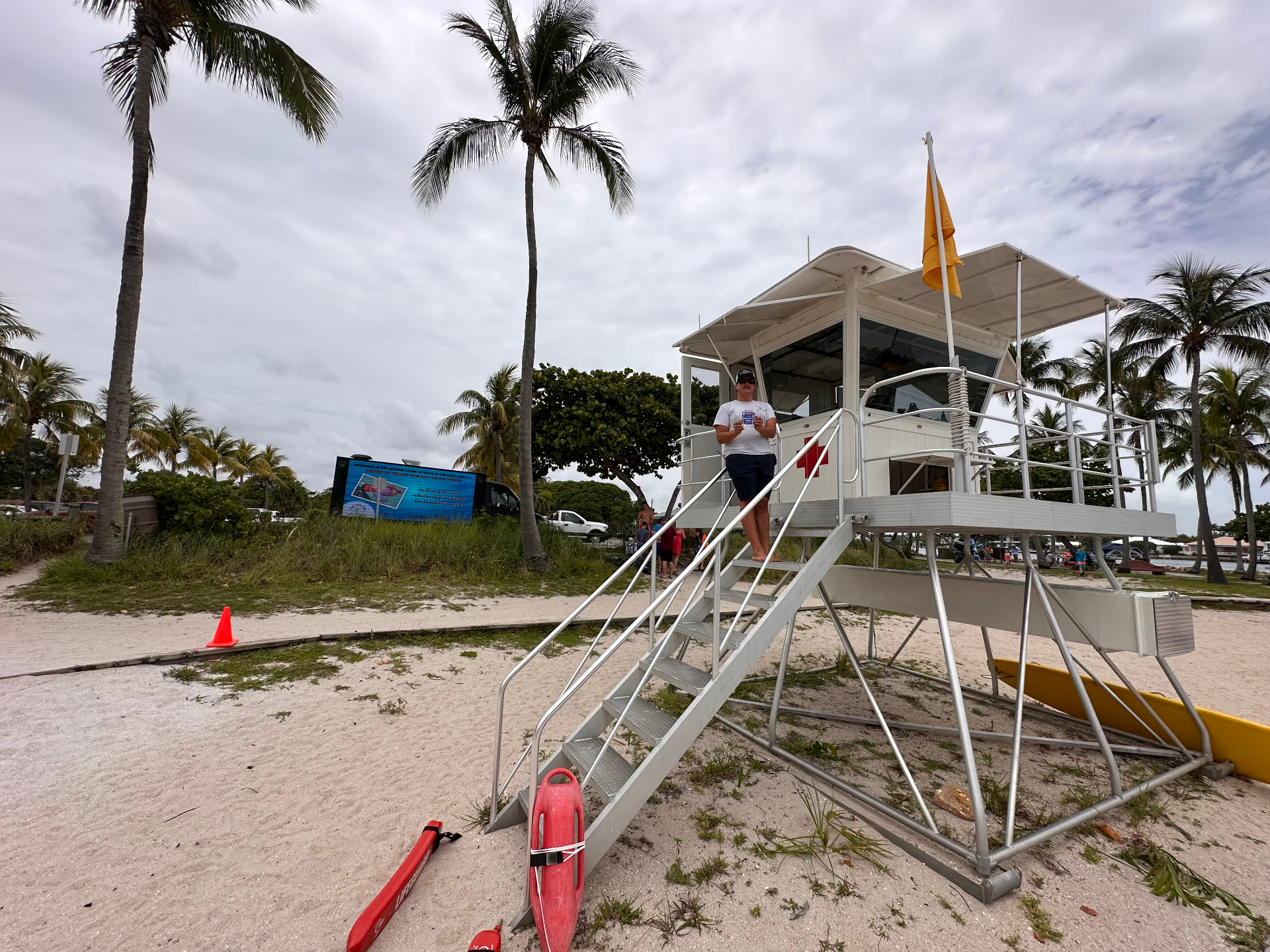 Community activation — beachside deployment for a family scholarship fund.