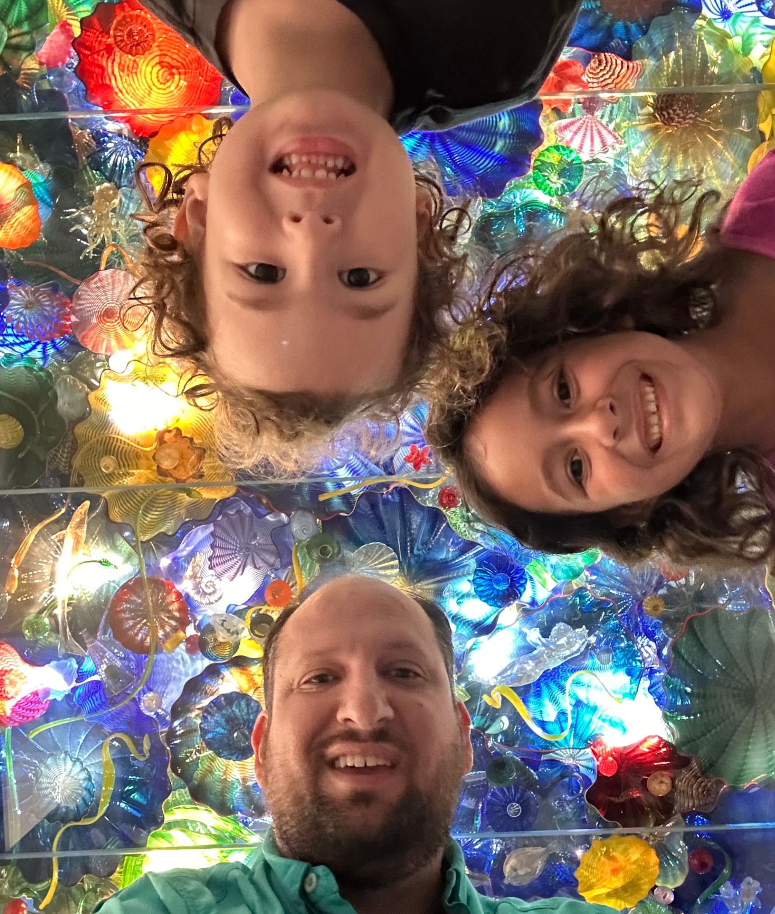 Nick Joyce with his two children at the Chihuly glass exhibit